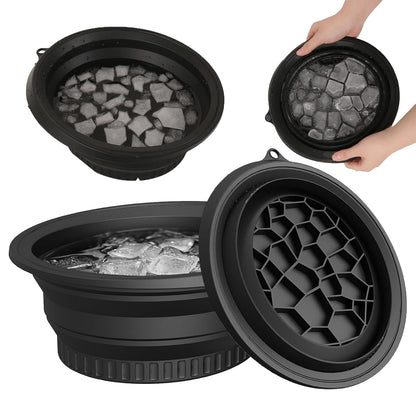 Black silicone ice face bowl filled with ice cubes, shown at an angle with its ribbed, collapsible sides
