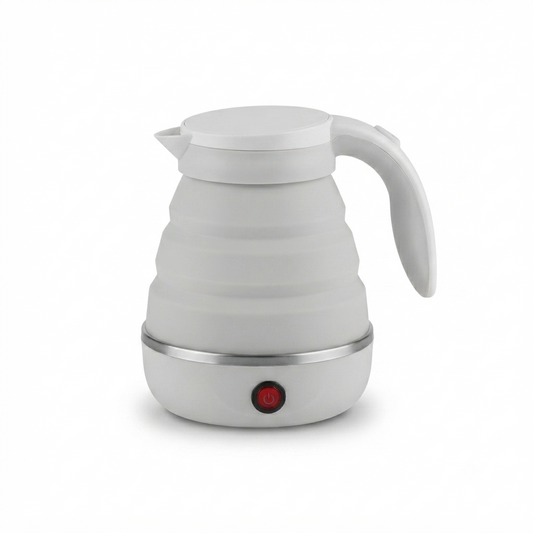 White electric foldable kettle on a plain background